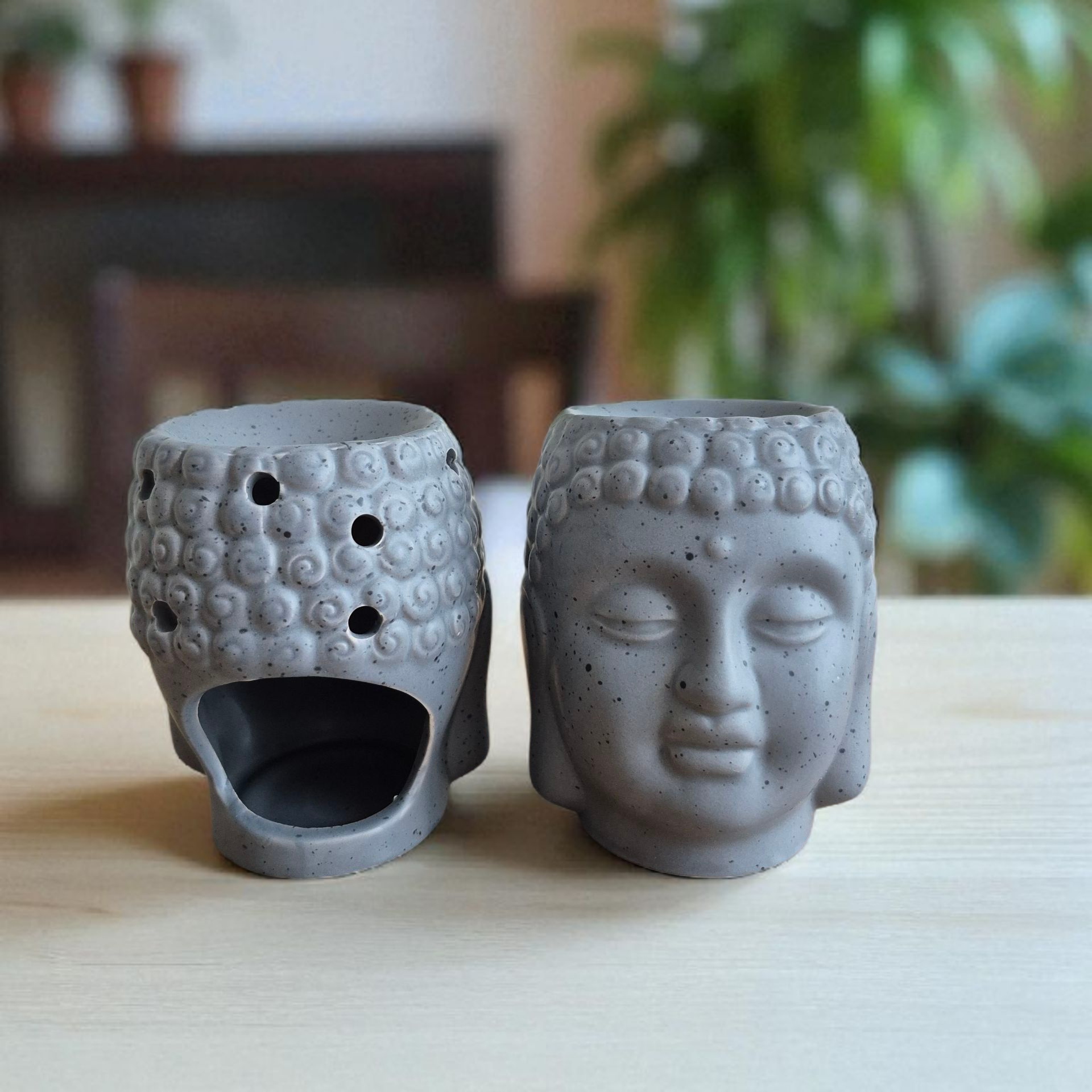 Brûle-parfum Tête de Bouddha en céramique pour diffuser vos fondants parfumés avec élégance.