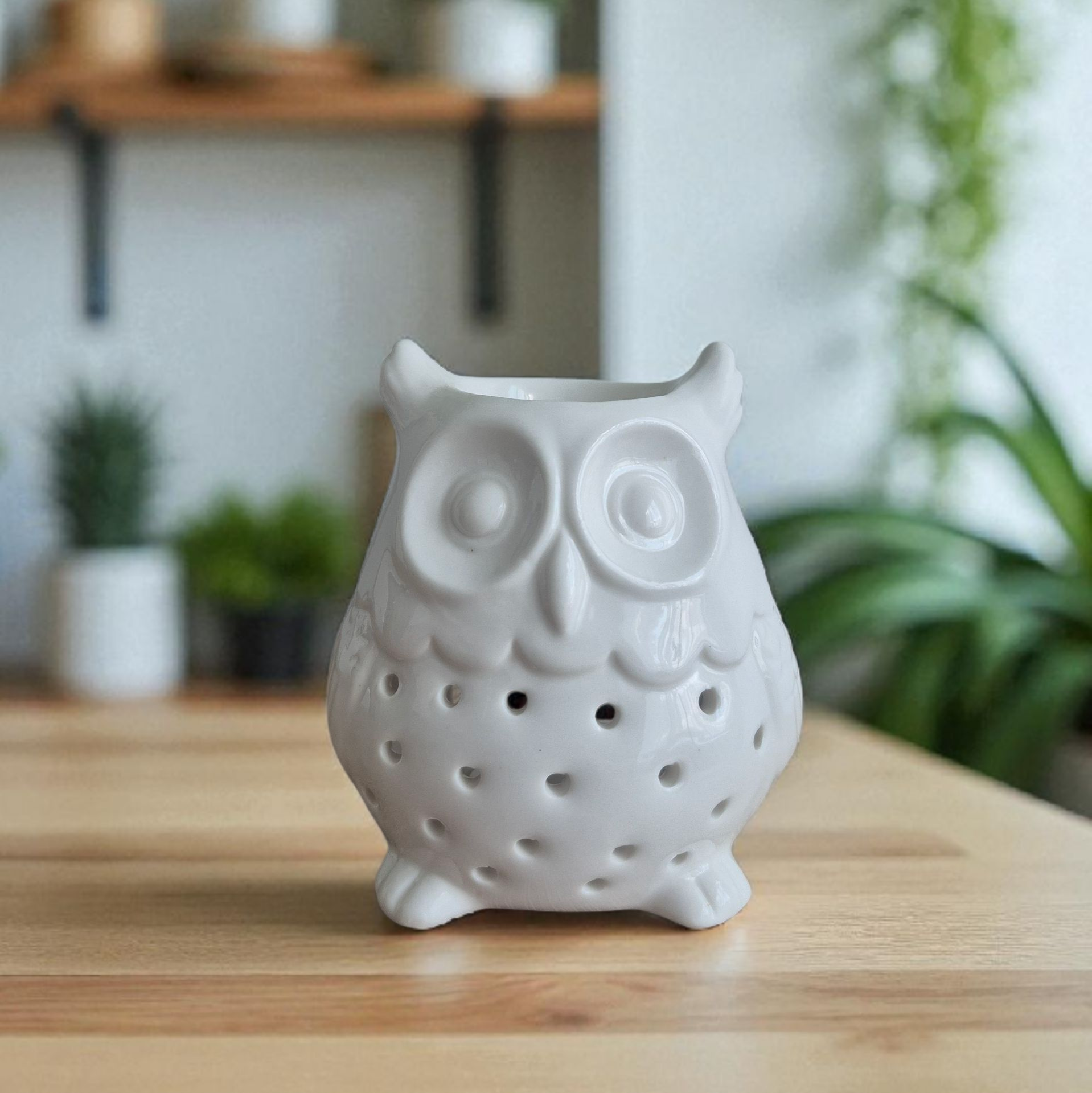 Brûle-parfum en forme de Hibou en céramique, idéal pour diffuser vos senteurs préférées dans votre intérieur.