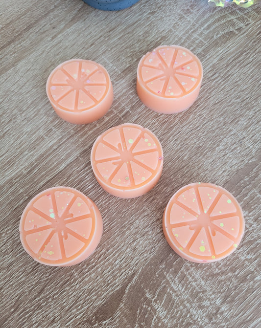 Fondants ronds en forme de rondelles de citron, parfum goyave fruité et exotique, faits main pour une diffusion naturelle et chaleureuse.